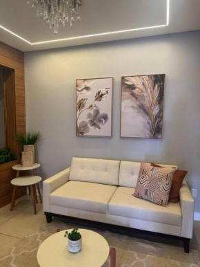Belo apartamento próximo á praia com garagem